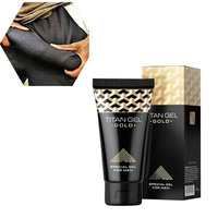Crema para Agrandar el Pene Titan Gel Gold en Tubo Negro al por Mayor, Fórmula Strong Man Maxman, Origen China, Ayuda a los Hombres a Lograr un Crecimiento Efectivo