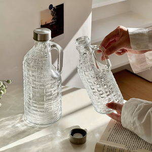 Bouteille en verre de cylindre transparent manipulé de 500ml 1000ml bouteille en verre de vin de lait de forme de tissage brésilien avec le bouchon à vis - Product Image 2