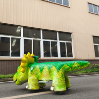 Voiture électrique mécanique en forme de dinosaure pour parc d'attractions, idéale pour centre commercial