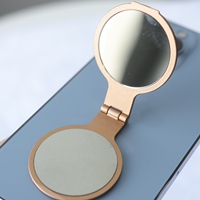 Support de bureau et de voyage pliable en métal, réglable, anti-poussière, avec adhésif flexible et motif zodiacal 3D en relief, pour téléphone portable