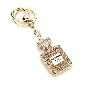 Fashion Fresh Metal <b>Keychain</b> with Round Crystal Pendant, <b>Custom</b> Enamel Compass for Women's Bag Charm, Gift for New Year - Product Image 2