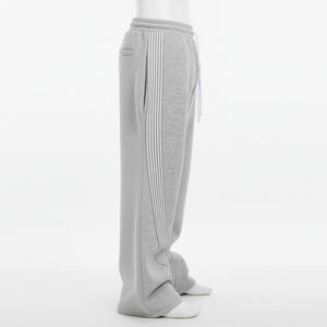 2026 Vente en gros Pantalon de <span class=keywords><strong>jogging</strong></span> streetwear pour homme en coton, coupe oversize ample, jambe large, avec logo personnalisé et bandes latérales superposées - Product Image 3