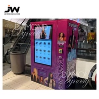 Distributeur automatique de vêtements de grande capacité pour t-shirts, chaussettes, etc. avec paiement par carte, pièces et billets.