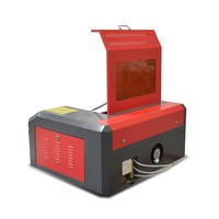 Petite machine de gravure laser bon marché pour logo 3040 4030 40w 50w CO2 machine de découpe laser cnc routeur mini découpeur laser
