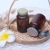 Bouteilles en verre dépoli de haute qualité 100ml 200ml 300ml, en verre sodocalcique moulé ambré et bleu pour compléments alimentaires avec couvercle métallique