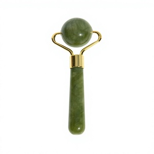 Rodillo Facial de Jade Xiuyan 100% Natural con Cabezal Redondo y Mango de Metal Dorado - Product Image 4