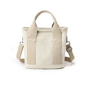 Sac fourre-tout en toile imperméable pour femme avec fermeture éclair, poignée souple et design multi-poches pour les voyages et l'usage quotidien - Product Image 1