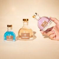 Bouteille de diffuseur d'arôme en verre vide en demi-cercle transparent créatif de 30 ml 50 ml 100 ml avec bouchon d'étanchéité pour l'aromathérapie