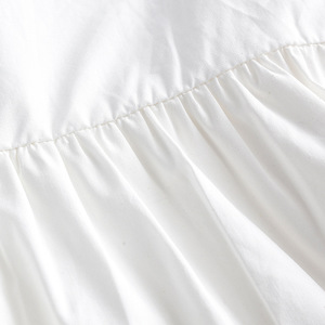 Chemise blanche à manches longues et volants pour fille, design à manches évasées, provenant d'un fournisseur chinois - Product Image 5