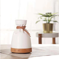 Diffuseur d'arômes créatif en forme de pochette avec base en bois, humidificateur ultrasonique d'huiles essentielles, attache en cuir pour chambre, spa, boutique, cadeau