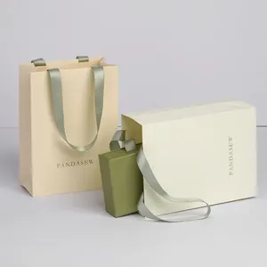 <span class=keywords><strong>Stampa</strong></span> su misura il tuo Logo borsa di carta per lo Shopping di marca di lusso per abbigliamento cosmetico scarpe da regalo borsa Boutique con manico a nastro - Product Image 5