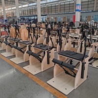 Chaise de Pilates Wunda en bois d'érable, la plus vendue par Highwind, pour exercices de Pilates et de yoga en studio