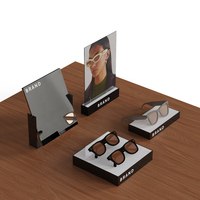 Affichage de point de vente optique de comptoir Riser d'affichage de lunettes au détail Blocs d'affichage de lunettes de marque personnalisée avec miroir