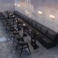 Ensemble de sièges et table de style industriel pour les bars et les pubs, canapé rembourré en cuir avec table en marbre noir