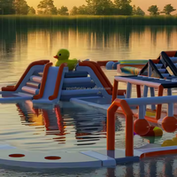 Grand château de trampoline de parc aquatique flottant gonflable de conception de jeu de thème de canard jaune pour le parc aquatique de sports de lac