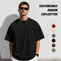 T-shirt surdimensionné noir uni à manches courtes en coton 100% 300 g/m², coupe streetwear, épaules tombantes, personnalisable avec logo pour homme