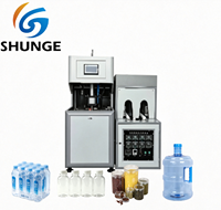 Machine de soufflage de bouteilles PET semi-automatique à deux étapes avec PLC et moteur, haute productivité, haute qualité, directement du fabricant