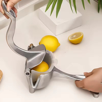 Handmatige citruspers van zwaar metaal, aluminiumlegering, voor één hand, geschikt voor citroen, limoen en ander citrusfruit.