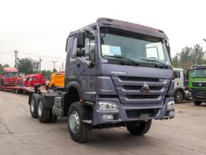 Camion tracteur HOWO-7 6X4 500HP Diesel <span class=keywords><strong>Euro</strong></span> <span class=keywords><strong>2</strong></span> d'occasion avec cabine à toit plat, climatisation et caméra arrière pour le transport d'engins - Product Image 2