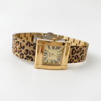 Montre de créateur à imprimé léopard doré, tendance audacieuse, élégante, quartz, style vintage, acrylique, résistante à l'eau 30M