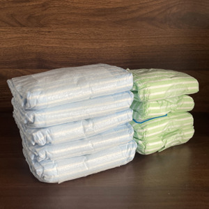Vente en gros de couches jetables imprimées à rayures de grande taille pour chiens et animaux de compagnie (mâles et femelles), douces et très absorbantes - Product Image 1