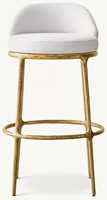 Tabouret de bar à hauteur de comptoir à quatre pieds avec cadre sculptural en laiton martelé, dossier semi-courbé et coussin en lin blanc