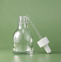 Flacon compte-gouttes en verre transparent, flacon pour essence liquide, flacon d'huile essentielle de 50 ml, flacon d'emballage pour produits de soin de la peau