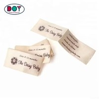 Logo personnalisé bordure tissée 100% ruban polyester sérigraphié étiquettes en satin d'entretien bon marché pour bébé tissu