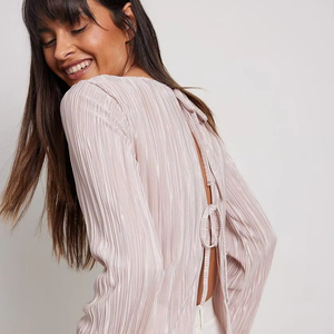 <span class=keywords><strong>Camisa</strong></span> plisada para mujer Europa <span class=keywords><strong>y</strong></span> América 2025 Verano Elegante Temperamento Slim Fit Trompeta Mangas Correa trasera <span class=keywords><strong>Camisa</strong></span> <span class=keywords><strong>corta</strong></span> - Product Image 1
