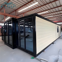 Maison conteneur en acier extensible à double aile de luxe de 20 à 40 pieds, préfabriquée, pliable, deux chambres, une salle de bain, pour bureau, hall