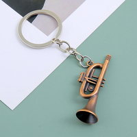 Nouveau design personnalisé en alliage de zinc, pendentif porte-clés trompette saxophone 3D simulé, cadeau souvenir musical étanche et tendance