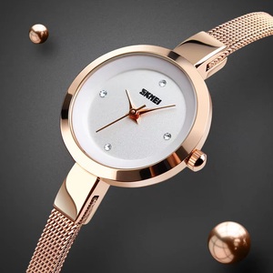 Montre à quartz pour femme SKMEI, montre-bracelet de luxe en acier inoxydable avec lunette en diamant, cadran minimaliste, montre d'affaires étanche - Product Image 1