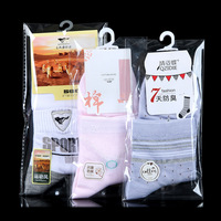 Vente en gros Sac d'opp en plastique de haute qualité avec broderie personnalisée Chaussettes pour enfants Sacs d'emballage BOPP pour vêtements tricotés
