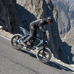 Bicicleta Eléctrica de Montaña con Llantas Anchas para Subir Colinas, con Transmisión de 7 Velocidades, Modelo Switchback Cruiser para Aventuras en Caminos de Montaña - Product Image 1