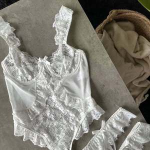 Meilleures ventes : Ensemble soutien-gorge et culotte pour femme, style body une pièce, ajouré, transparent, à motifs floraux, sexy et érotique - Product Image 6