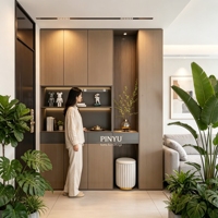 Dressing contemporain en bois composite foncé avec zones de suspension ouvertes, tiroirs et éclairage d'ambiance