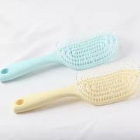 Brosse à cheveux ronde de massage du cuir chevelu bouclée mignonne de voyage personnalisée avec marque privée, massage du cuir chevelu en gros avec logo