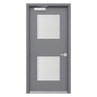Porte en acier galvanisé ignifugée 30 minutes pour salle mécanique de bâtiment commercial avec grille et ferme-porte ignifugés