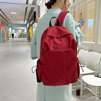 Sac à dos en nylon imperméable uni, simple, transfrontalier, avec sangle à coussin d'air, personnalisable, grande capacité, unisexe, portable, pour étudiants