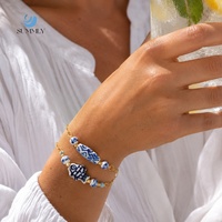 Bracelet élégant en acier inoxydable plaqué or SUMMLY18K avec perles en porcelaine bleue et blanche, bracelet imperméable et résistant à la décoloration