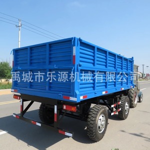 Remolque Agrícola Autovolcable de Alta Productividad con Caja de Carga Azul y Tracción 4x4 - Product Image 1