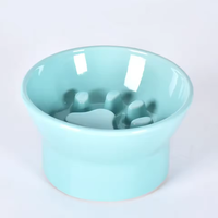 Vente en gros de bols écologiques en céramique pour animaux de compagnie Conception portable personnalisée avec protection cervicale Nouveauté bols mangeoire pour chat et chien