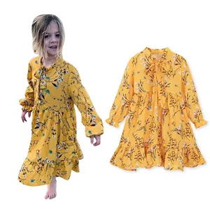 Boutique all'ingrosso abbigliamento per bambini neonate abito da festa per bambini a maniche lunghe stampato in Chiffon giallo