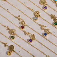 Vente en gros Bijoux en acier inoxydable plaqué or Pvd 18 carats étanches non ternis Bracelets porte-bonheur pierre de naissance mois fleur pour femme