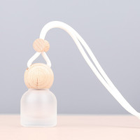 Bouteille suspendue colorée vide rose givré clair 10ml diffuseur de parfum de voiture en verre rond avec couvercle en bois