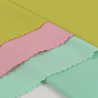 Tissu jersey extensible quatre directions en polyester-spandex 100D, soie de lait, teint, 180 g/m², résistant à l'abrasion ; en bobine
