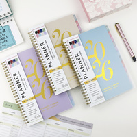 Cahier à reliure à spirale imprimé personnalisé en usine Journal de planification à couverture rigide dorée avec organisateur en papier carton
