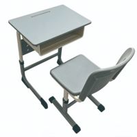 Ensemble Chaise et Bureau Scolaire en Métal à Hauteur Fixe avec Panneau Perforé, Table d'Étude Grise Durable avec Boîte à Livres, Mobilier Étudiant Moderne