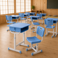 Ensemble bureau et chaise pour étudiants réglables en hauteur avec surface de travail en plastique, structure en métal et tiroir pour l'étude en classe