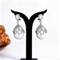 Boucles d'oreilles pendantes coréennes tendance en cuivre avec grandes perles et zircons pavés en forme de goutte, inaltérables, bijoux de mariage pour femmes 2026